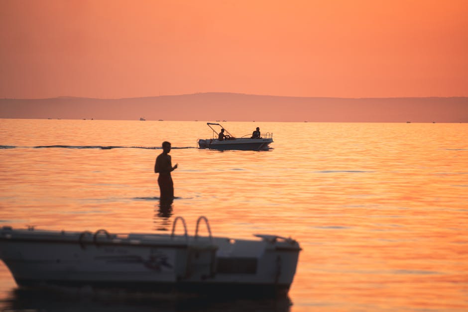 A person tasting a slice of pineapple on a sunny beach